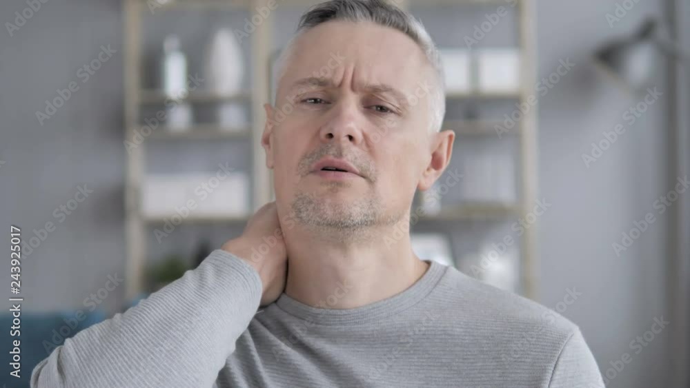 Tired Gray Hair Man Trying to Relax Body by Stretching Tired Gray Hair Man Trying to Relax Body by Stretching