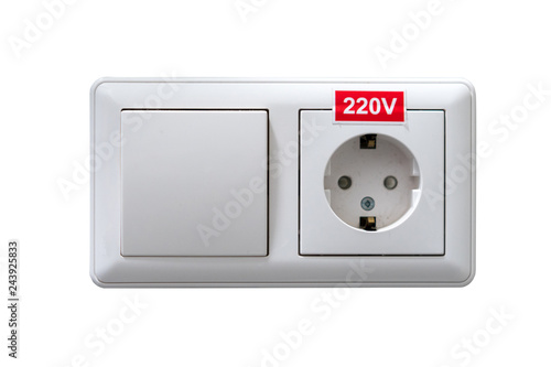 electric socket and a switch on the wall of the hotel. Isolated on white background