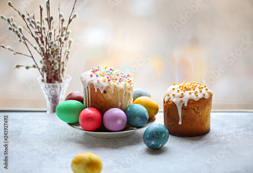 easter cake and eggs on wooden table