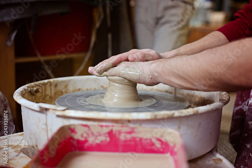 potter working on potters the wheel