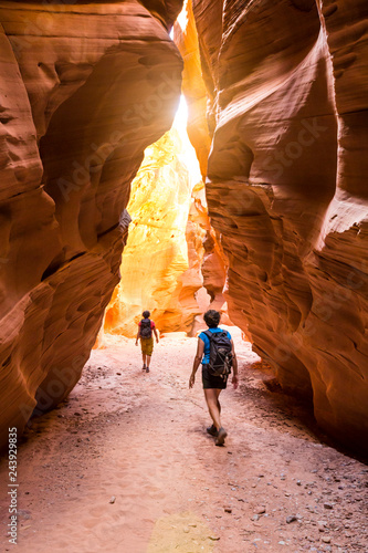 Women friends adventure travel hiking exploring in beautiful nature desert canyon