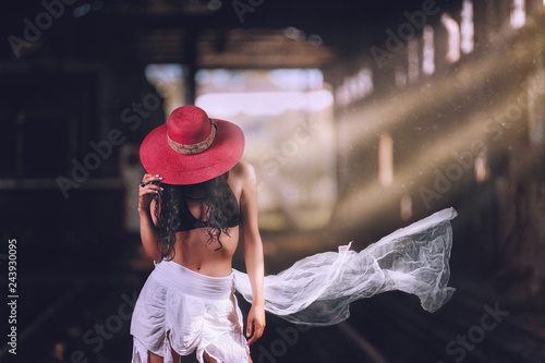 Wallpaper Mural Sexy girl with red hat posing in the abandoned place environment. Face is not visible. Torontodigital.ca