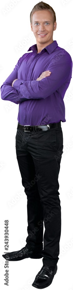 Causually dressed male with his arms crossed Causually dressed male with his arms crossed