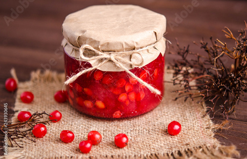 Kalina rubbed with sugar in a glass jar photo