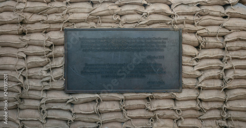 Checkpoint Charlie or Checkpoint C. Border between east and west Berlin at Cold War's period. photo