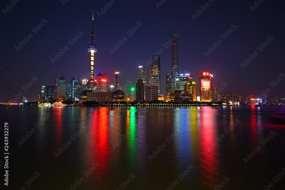 Night view of the modern Pudong skyline seen from the Bund in Shanghai, China 