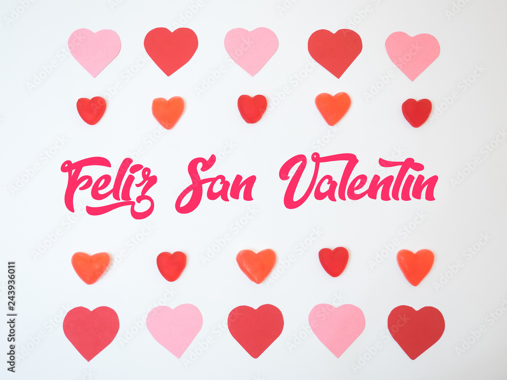 San Valentine´s hearts decorations made with red and pink papers and jelly beans and gummies