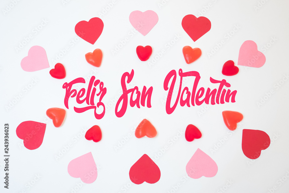 San Valentine´s hearts decorations made with red and pink papers and jelly beans and gummies