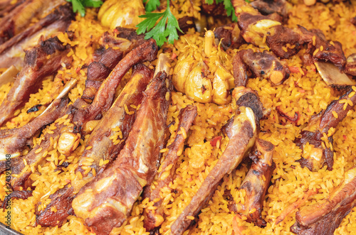 Pilaf closeup with meat ribs. photo