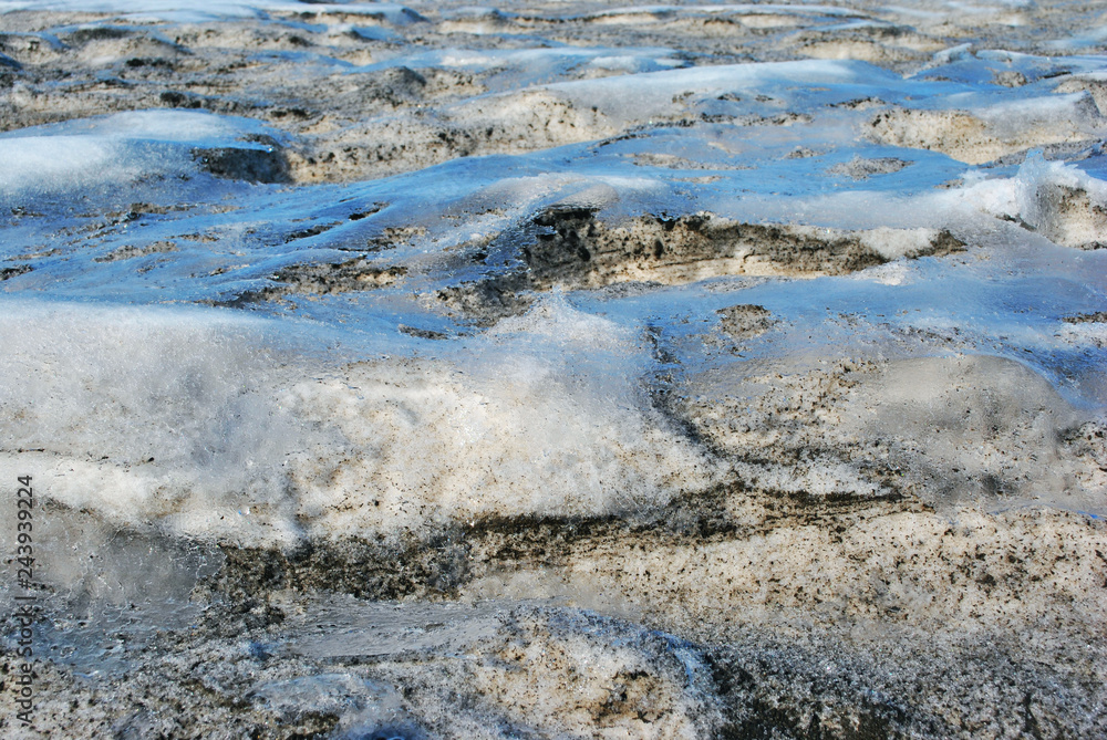 Dirty melting snow, early spring, natural background Dirty melting snow, early spring, natural background