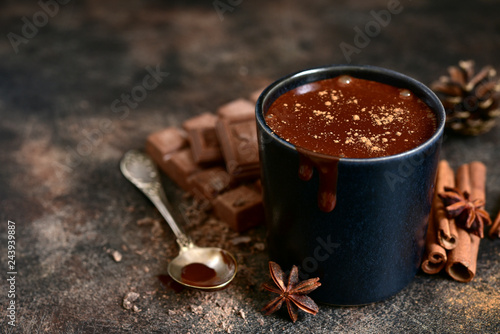 Homemade spicy hot chocolate in a black cup.