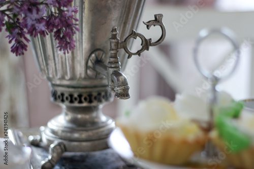A morning tea. A closeup of a tap and key of a vintage Russian samovar