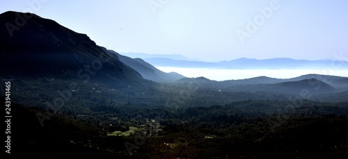 Corfu and morning mist