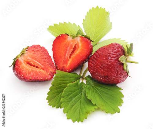 Ripe strawberry with leaves.