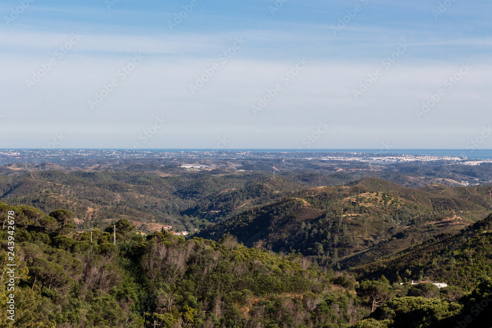 Beautiful nature landscape (panorama) in Alentejo, Portugal. Beautiful hills and ocean in the far background.