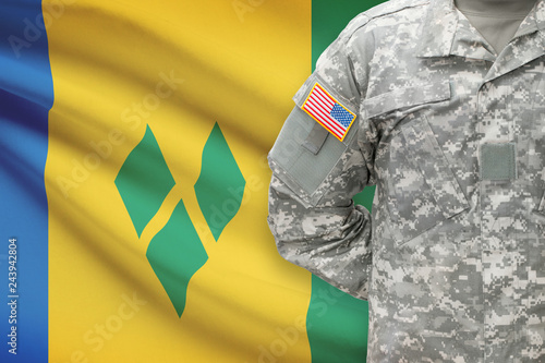 American soldier with flag on background - Saint Vincent and the Grenadines