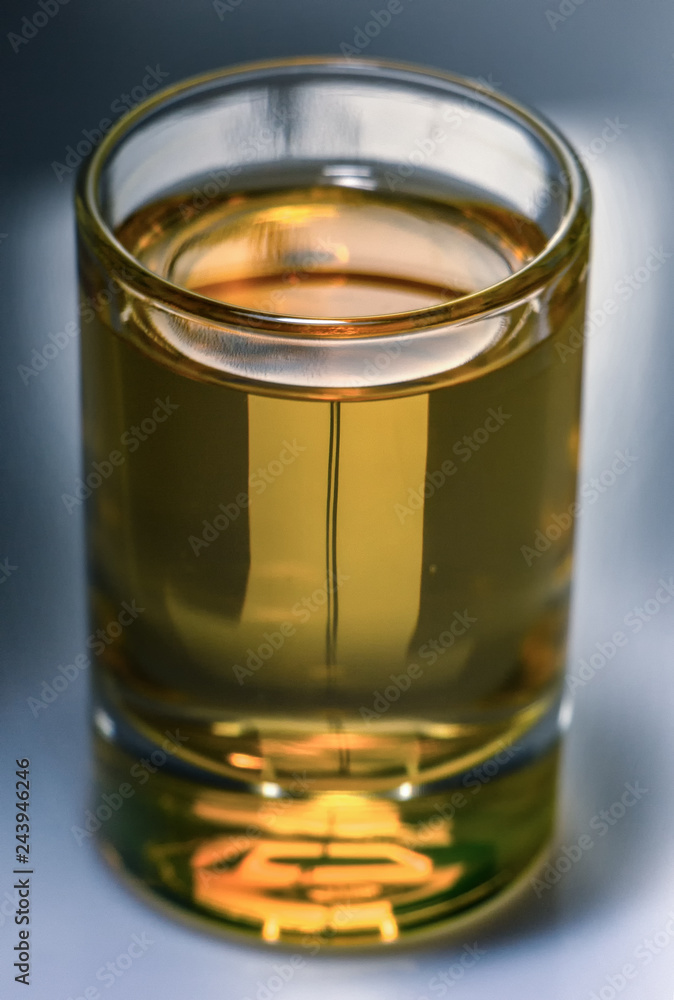 Pure water is poured into a glass beaker. Pure water is poured into a glass beaker.