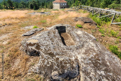 View of Early Middle Ages non-anthropomorphic grave of the 7th or 8th century at the Forcadas Necropolis Site near Fornos de Algodres, Beira Alta, Portugal photo