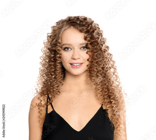 Portrait of beautiful young woman with shiny wavy hair on white background