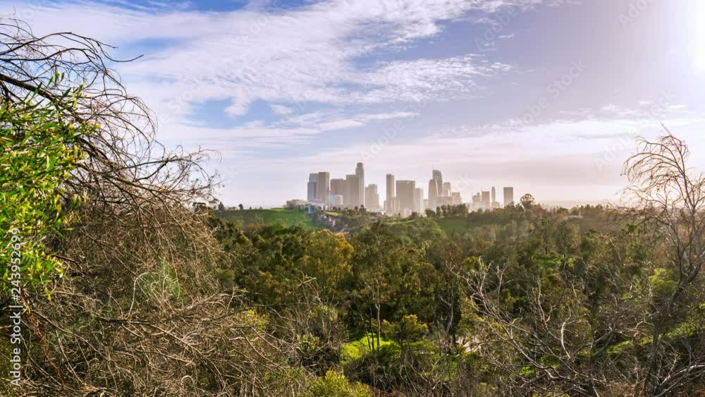 Timelapse Tracking Shot of Large Sun over Downtown LA Skyline -Pan Right- Timelapse Tracking Shot of Large Sun over Downtown LA Skyline -Pan Right-