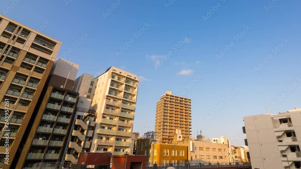 Timelapse of Sunset Sky over Residential Buildings in Yokohama -Tilt Up- Timelapse of Sunset Sky over Residential Buildings in Yokohama -Tilt Up-