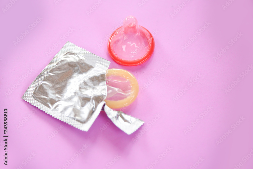 Condom Prevent Pregnancy Contraception Valentines safe sex concept / Birth Control with Condom Condom Prevent Pregnancy Contraception Valentines safe sex concept / Birth Control with Condom