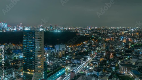 Wallpaper Mural Timelapse of Busy Shinjuku Cityscape at Night in Tokyo -Zoom In- Torontodigital.ca