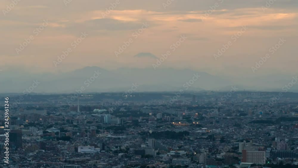 Timelapse of Day to Night Transition of Mt. Fuji over Tokyo -Long Shot- Timelapse of Day to Night Transition of Mt. Fuji over Tokyo -Long Shot-