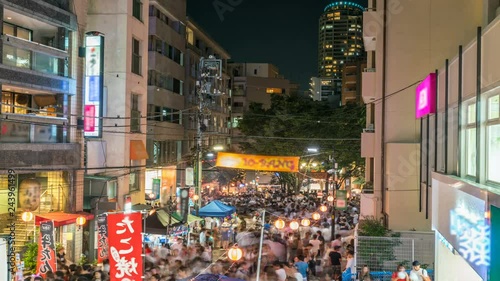 Timelapse of Unrecognizable Crowd at Azabu Juban Festival in Tokyo photo