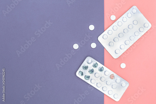Medical Or Pharmaceutical Preparations: Pills, Medicines On Pale Pastel Pink Purple Background, Top View. Copy Space For Text On Medical Topics.