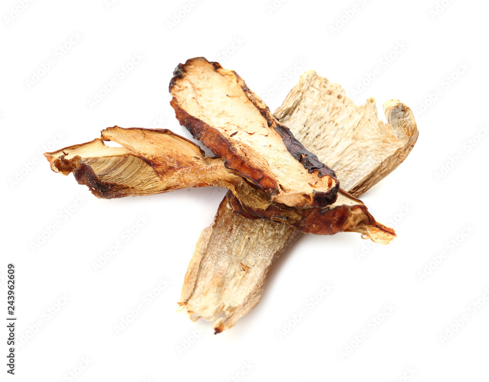 Fototapeta premium Slices of dried mushrooms on white background