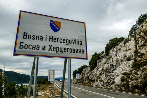 Road Sign Border, between Bosnia and Croatia border photo