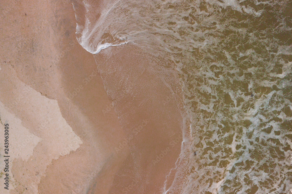Fototapeta premium Waves on the beach view from drone
