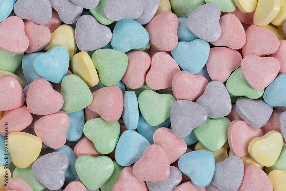 Pastel colored candy hearts macro background Stock Photo | Adobe Stock