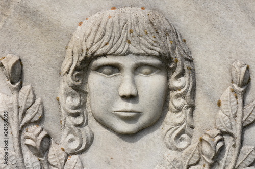 BISTRITA, ROMANIA, statue in cemetery, BABY FACE SCULPTURE