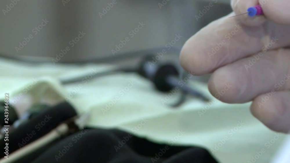 Dentist takes a print of teeth. Works on implants. Change braces Dentist takes a print of teeth. Works on implants. Change braces