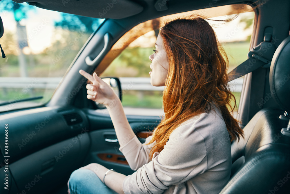 woman riding in car