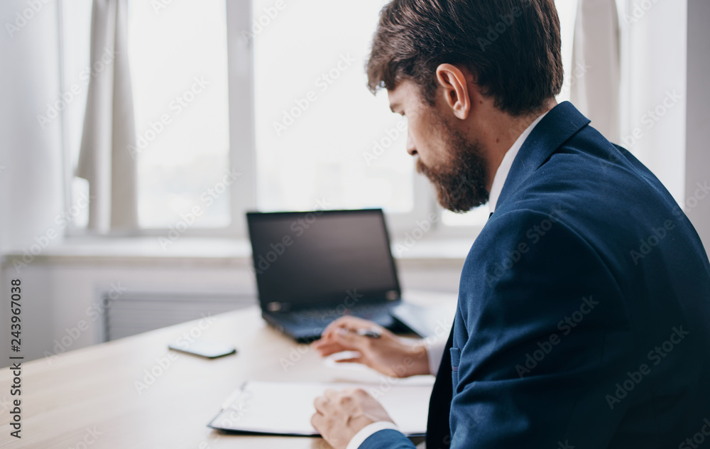 business man working on a laptop business man working on a laptop