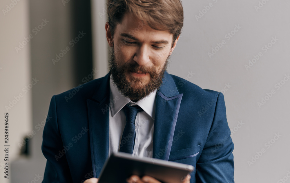 business man with a beard in the office business man with a beard in the office