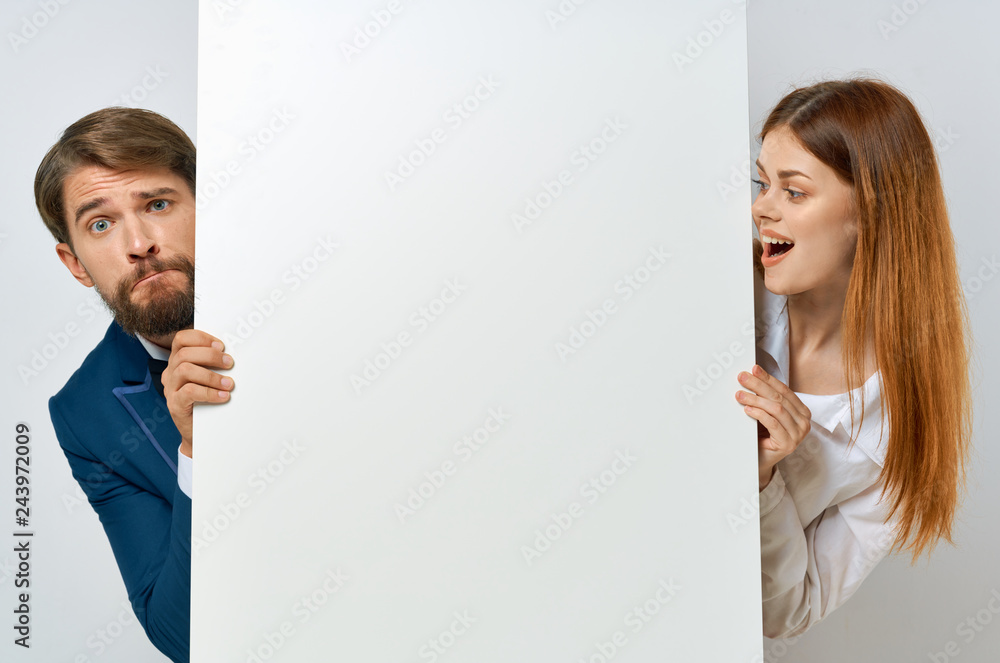 young couple holding banner place free background young couple holding banner place free background
