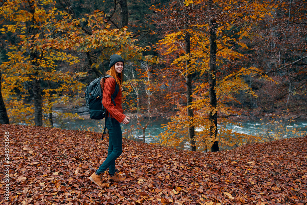 young woman running in autumn forest young woman running in autumn forest