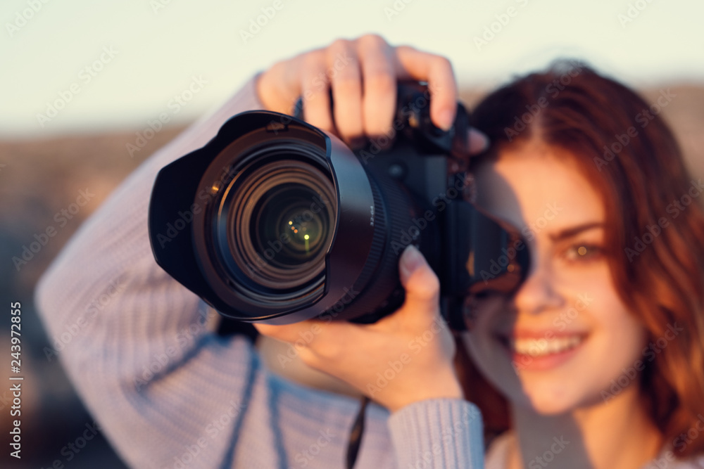 woman takes pictures on camera woman takes pictures on camera