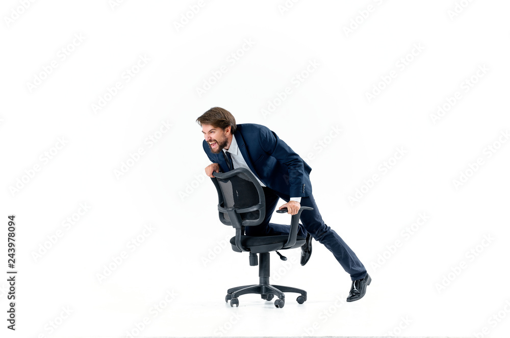 man riding a chair on an isolated background man riding a chair on an isolated background