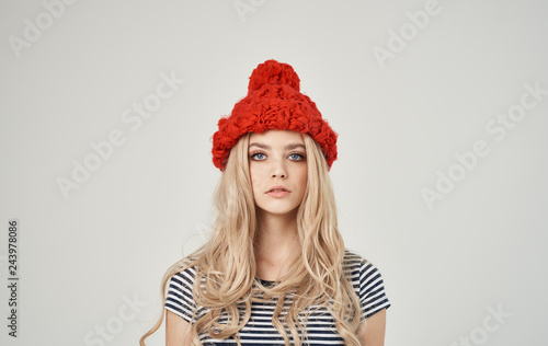 woman in a hat on a light background © SHOTPRIME STUDIO
