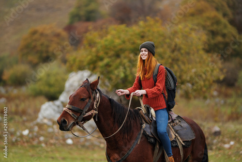 woman riding a horse