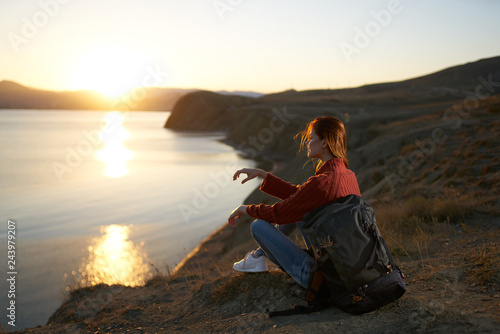 sunset sea hike woman