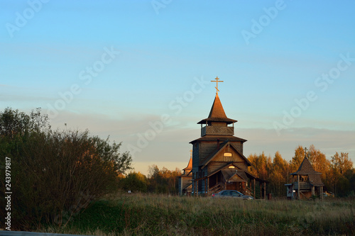 The Old Ritualists Orthodox wooden church at sunset photo