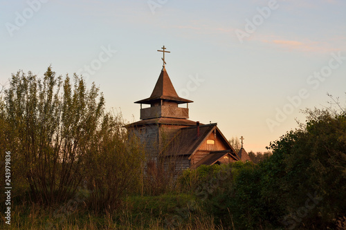 The Old Ritualists Orthodox wooden church at sunset