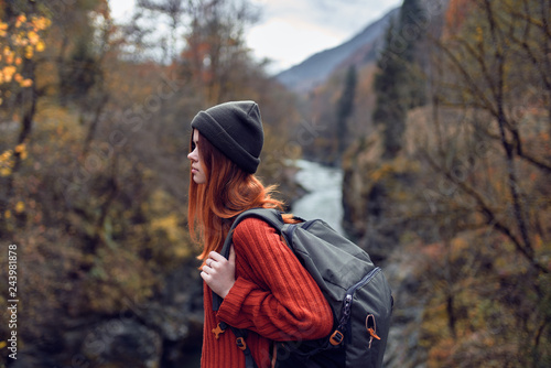 woman with backpack on nature in the forest © SHOTPRIME STUDIO