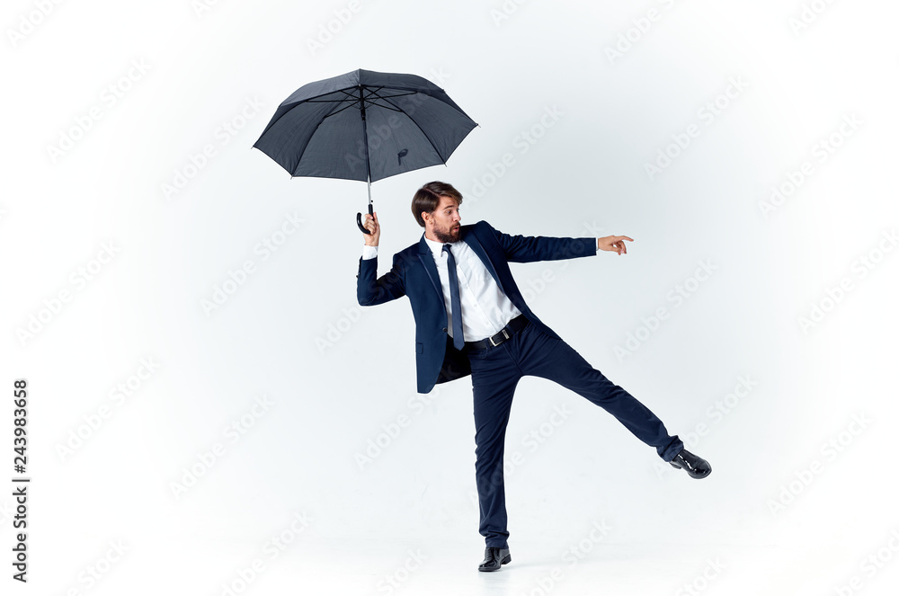 business man with umbrella on an isolated background business man with umbrella on an isolated background